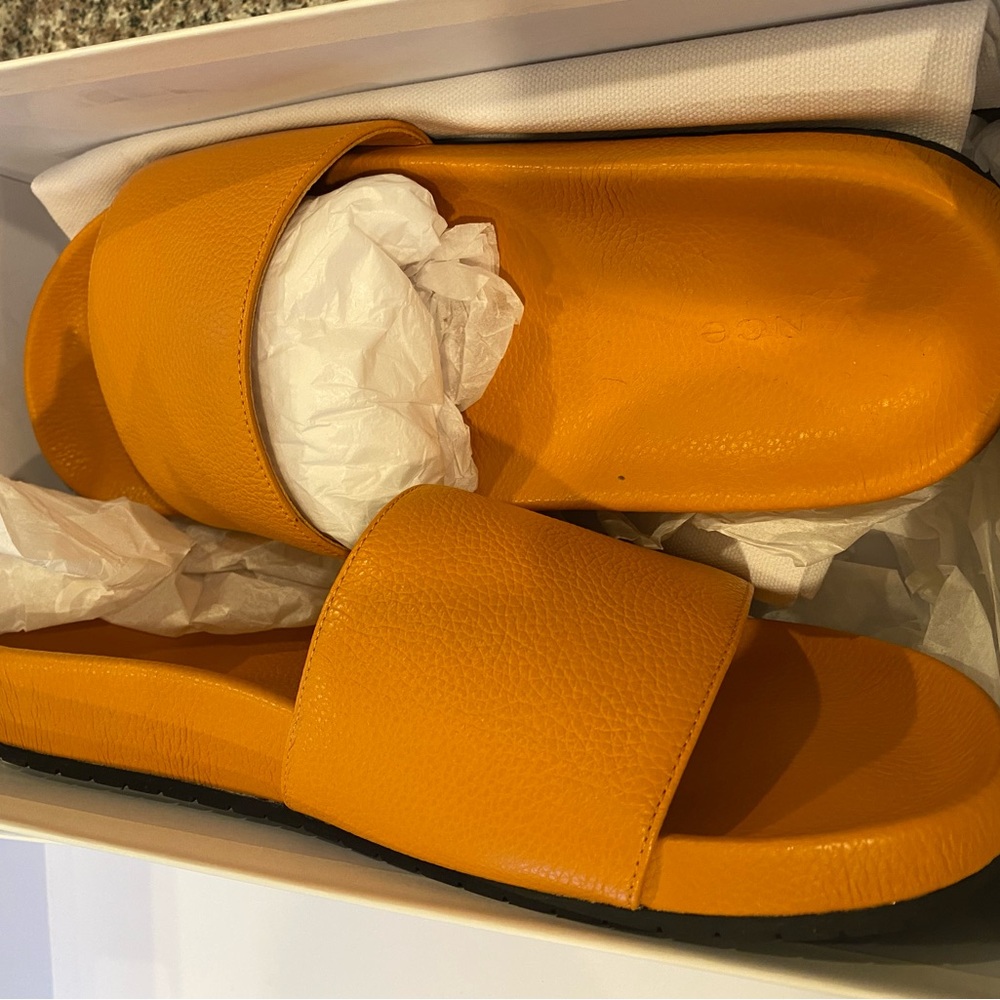 Beautiful Vince leather slides. Never worn
